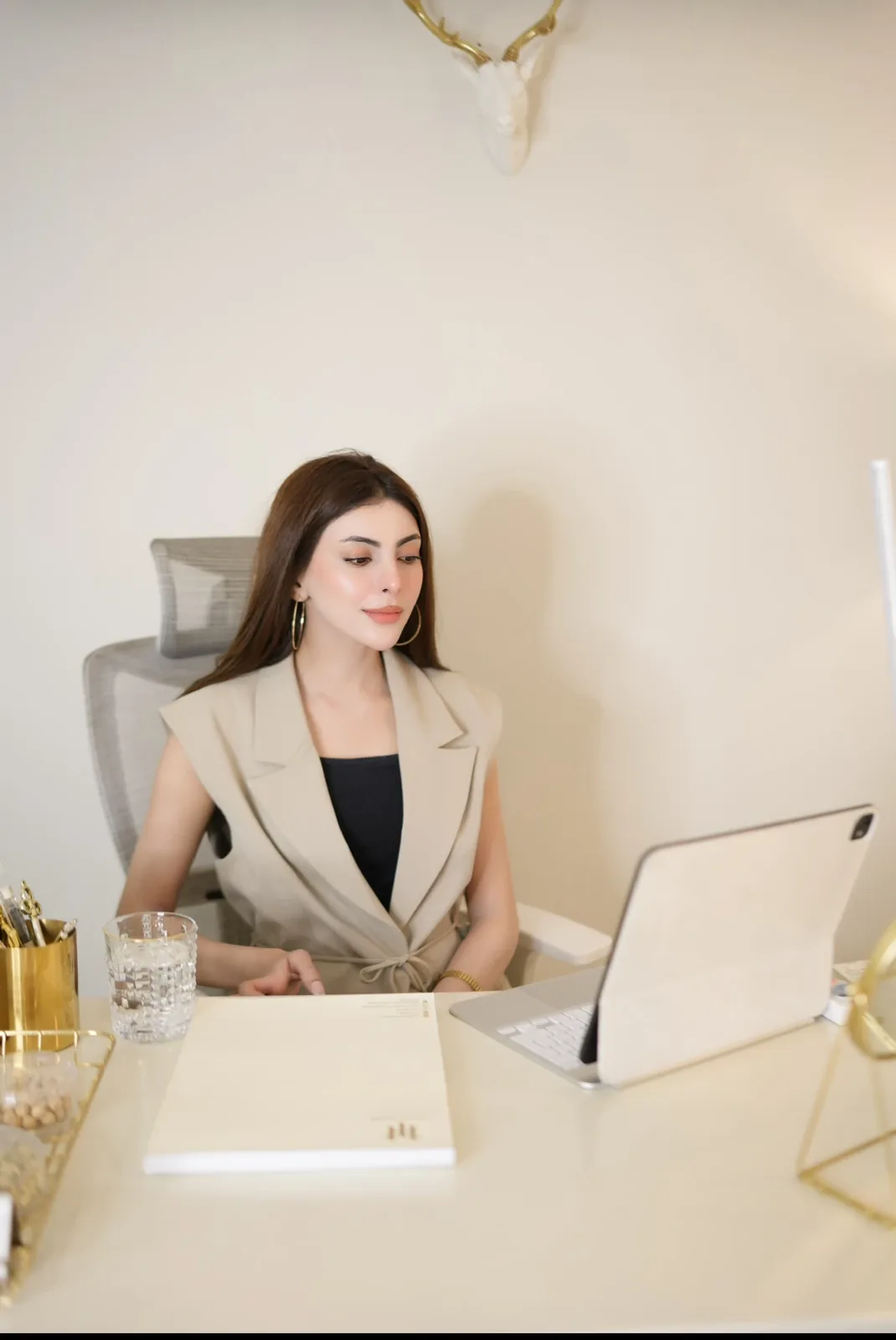 Dr. Taniya Habib reviewing a treatment plan at her desk