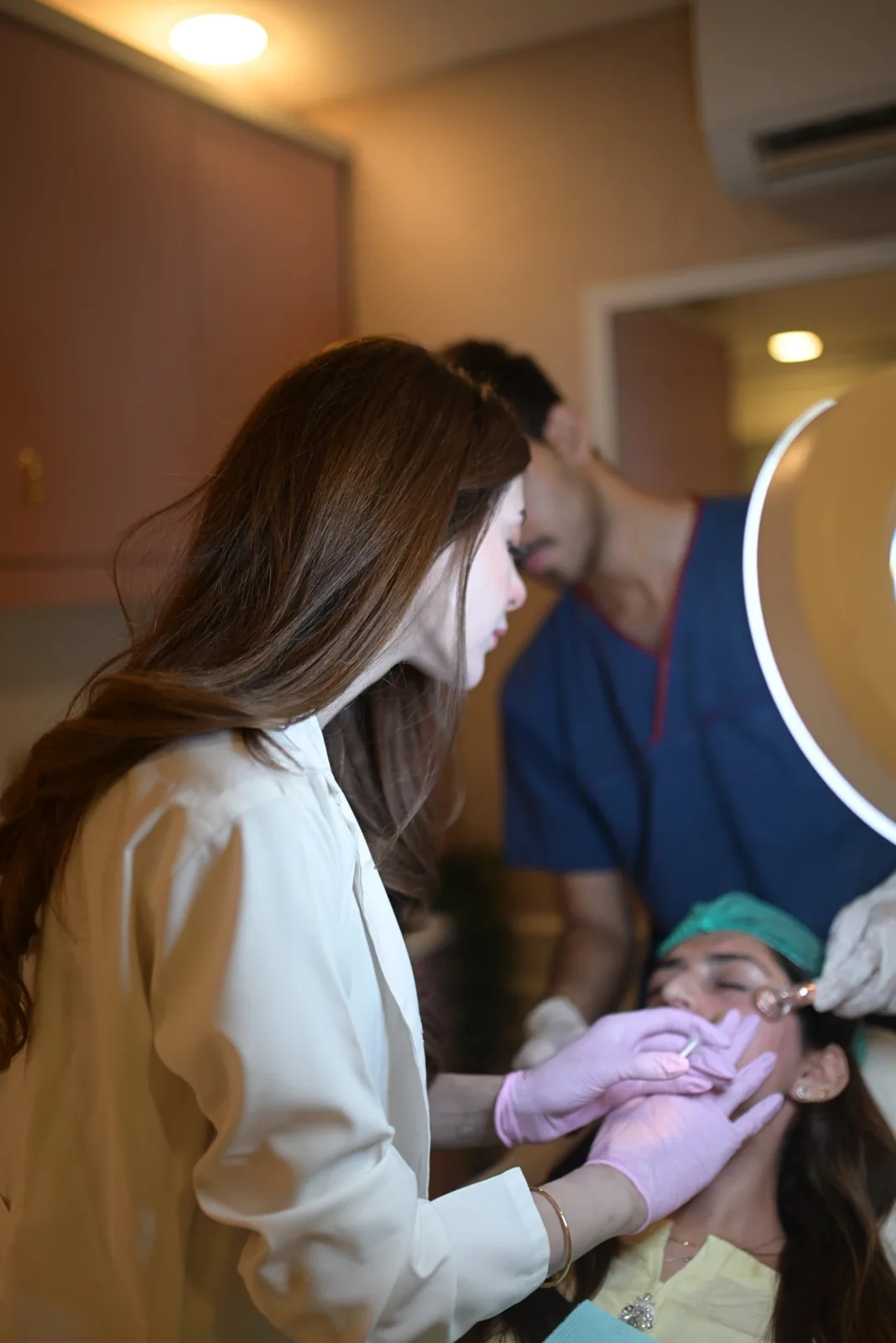 Dr. Taniya Habib performing an injectable treatment